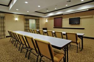 a conference room with a long table and chairs at Hampton Inn & Suites Buffalo in Buffalo