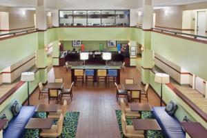 an overhead view of a cafeteria with tables and chairs at Hampton Inn Bremen in Bremen