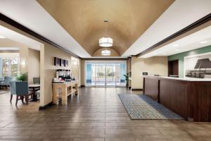 an empty lobby of a hospital with a waiting room at Hampton Inn & Suites Brunswick in Brunswick