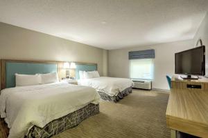 Postel nebo postele na pokoji v ubytování Hampton Inn Batavia