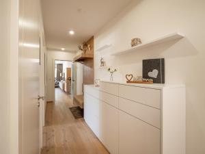 Kuchyň nebo kuchyňský kout v ubytování Herzi Chalet - top ausgestattet, neu, chic und sehr gemütlich