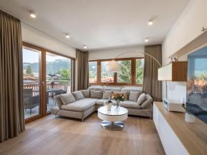 Posezení v ubytování Herzi Chalet - top ausgestattet, neu, chic und sehr gemütlich
