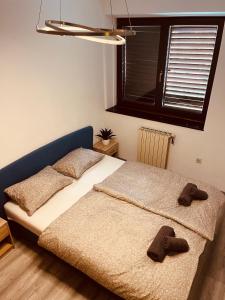 Postel nebo postele na pokoji v ubytování Lea apartment