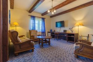 TV a/nebo společenská místnost v ubytování Ruunawere Hotel