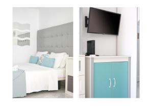 TV a/nebo společenská místnost v ubytování Suite Infinity Ocean - sea view