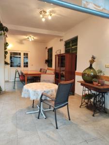 Фотография из галереи Apartmani Grubelić - komforan novi apartman в Трибуни