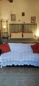 Кровать или кровати в номере La Casa del Nonno - Tiny House