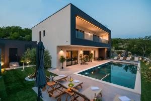 Πισίνα στο ή κοντά στο Luxury Villa Hedonica