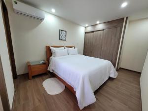 Łóżko lub łóżka w pokoju w obiekcie Apartamento Base Aragua con planta eléctrica