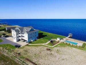 an aerial view of a house and the ocean at RSR2A - Endless Sunsets in Rodanthe