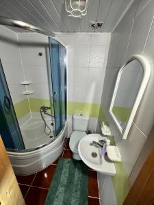 Ванная комната в Приват-котедж Зарінок