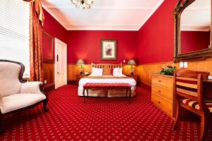 Voodi või voodid majutusasutuse Prince's Gate Hotel toas