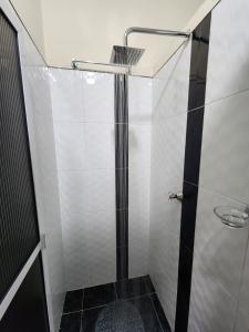 Ένα μπάνιο στο Alojamiento con Aire acondicionado - Shelter La Perla