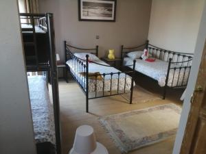 Un pat sau paturi într-o cameră la Residentie Kathy Westende