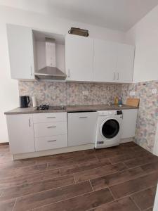 Kuchyň nebo kuchyňský kout v ubytování Centrum + 2 fotografie