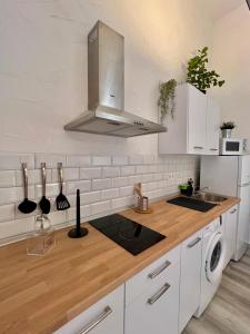 Kuchyňa alebo kuchynka v ubytovaní La Parra Apartamento