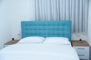 Vb apartmani客房内的一张或多张床位