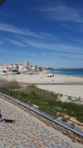 a view of a beach and the ocean at Marinamed Residential Villa Sea View in Orihuela Costa