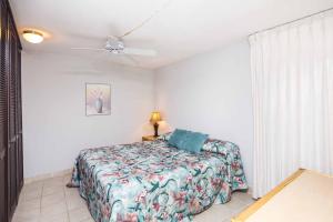 Ένα ή περισσότερα κρεβάτια σε δωμάτιο στο Paki Maui #118 condo