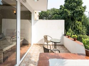 Ein Balkon oder eine Terrasse in der Unterkunft Amidst Monuments and Serenity