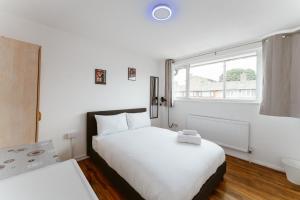 Postel nebo postele na pokoji v ubytování CanningTown Double Rooms - 20 + 23 fotografií