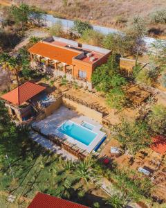 an overhead view of a house with a swimming pool at Rancho San Pablo in Oaxaca City