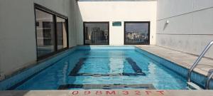 Bazén v ubytování Q-Flat Hotel - Faria Lima nebo v jeho okolí