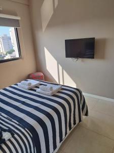 Televiisor ja/või meelelahutuskeskus majutusasutuses CAPi 1 Barrio Camba Cua