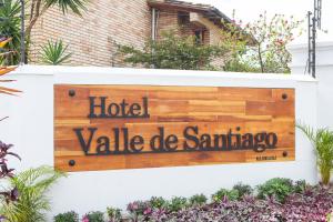 a sign for a hotel valle de santa ana at Valle de Santiago Hotel Boutique in San Cristóbal