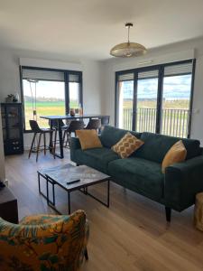 Χώρος καθιστικού στο A 10 mn de Disney Land Paris Appartement neuf