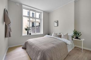Katil atau katil-katil dalam bilik di Family Friendly - Modern - City Central