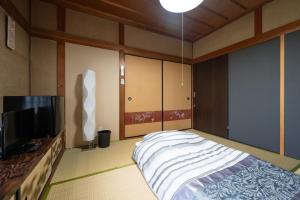 A bed or beds in a room at Chizu - Vacation STAY 83922v