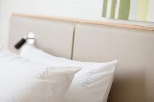 Holiday Inn Resort Shinano-Omachi Kuroyon by IHG客房内的一张或多张床位