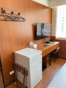 TV a/nebo společenská místnost v ubytování 盤古捷旅 - Panco Hotel