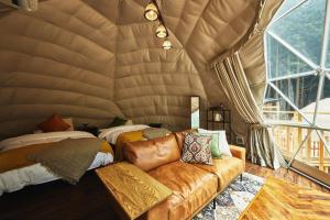 Postel nebo postele na pokoji v ubytování GLAMPING GATE 奈良