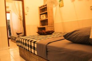 Postel nebo postele na pokoji v ubytování Seabreeze Hostel Bali