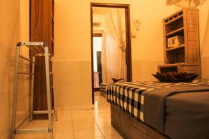 Postel nebo postele na pokoji v ubytování Seabreeze Hostel Bali