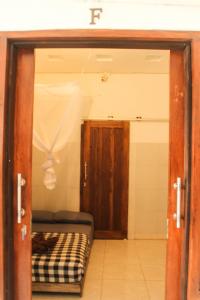 Postel nebo postele na pokoji v ubytování Seabreeze Hostel Bali