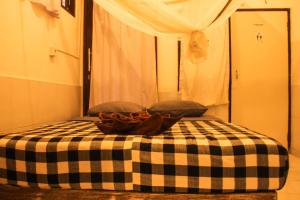 Postel nebo postele na pokoji v ubytování Seabreeze Hostel Bali