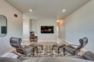 a living room with three chairs and a couch at Bright Central Point Home with Deck and Mountain Views in Central Point