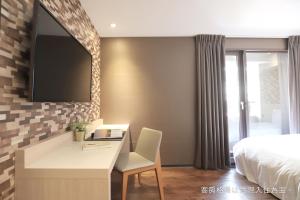 TV/trung tâm giải trí tại Talmud Hotel Yizhong