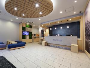 a lobby of a kazania store with a reception desk at Far East Village Hotel Tokyo, Asakusa in Tokyo