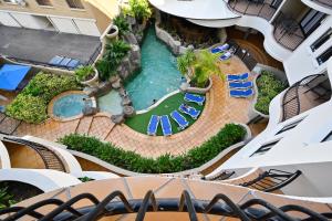 an overhead view of a pool at a resort at Mooloolaba 2 B/R Getaway - Perfect location ZD5 in Mooloolaba