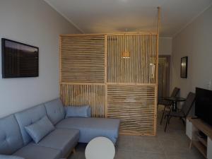Гостиная зона в Melissinos Beachfront Apartments
