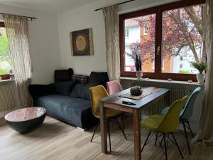 a living room with a couch and a table at Viva la Wildbad in Bad Wildbad