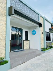 a entrance to a building with a revolving door at Villa Del Cascel in Bulala