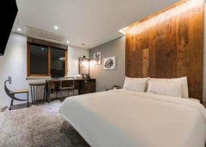 Hotel Days A客房内的一张或多张床位
