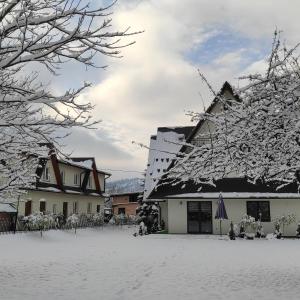 Apartamenty Cichy Kącik v zime
