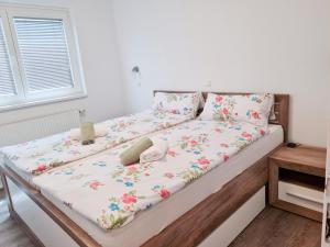 Postel nebo postele na pokoji v ubytování Apartment Rosa 119