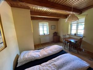 Giường trong phòng chung tại korsholt-natur B-B